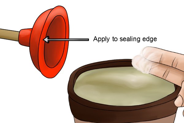 Apply petroleum jelly to the edge of the cup