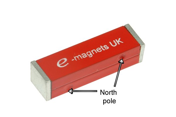 Notch indicating a north pole on two rectangle bar magnets joined together