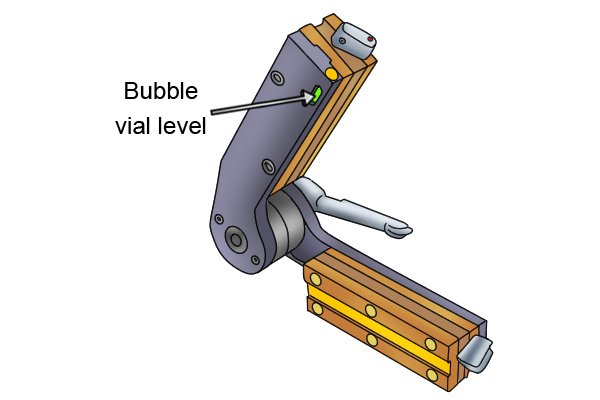 bubble vial level on a blue variable angle weld clamp magnet