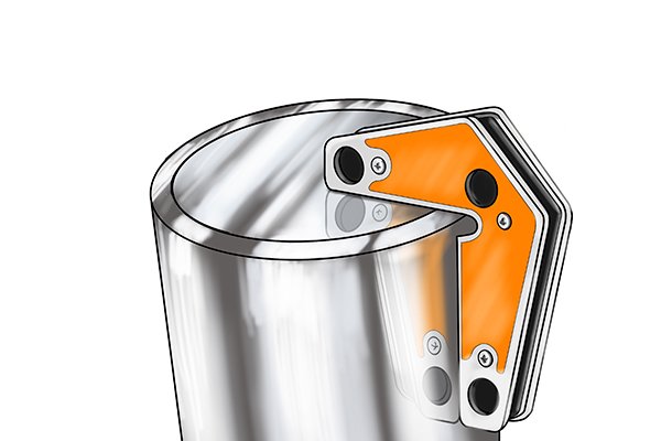 weld clamp magnet holding the cap onto the pipe Corner weld clamp magnet holding the cap onto the pipe