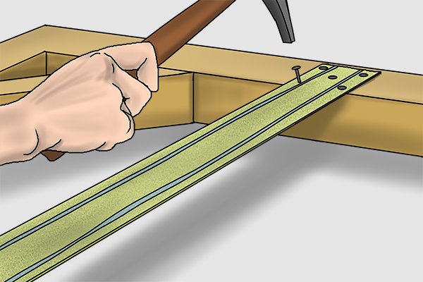Measure out webbing across the length of your furniture so it is ready to be pulled tight by the web stretcher