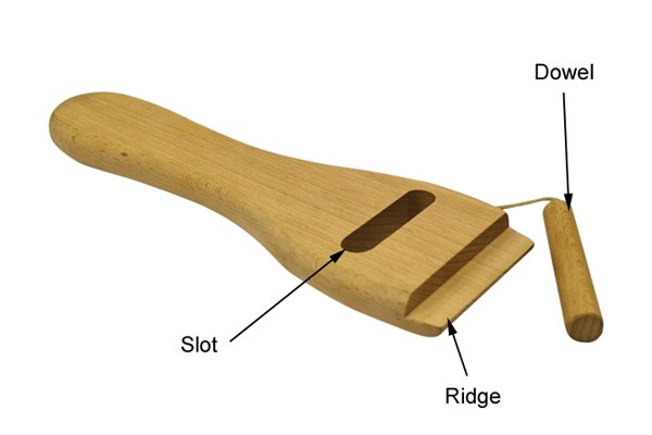 Parts of a slotted web stretcher, used to stretch out upholstery webbing; slot, dowel and ridge.