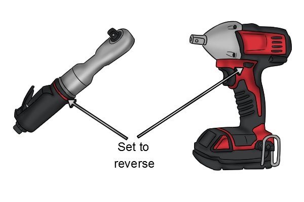 If you are using an air or electric impact ratchet then you will need to set it to reverse. 