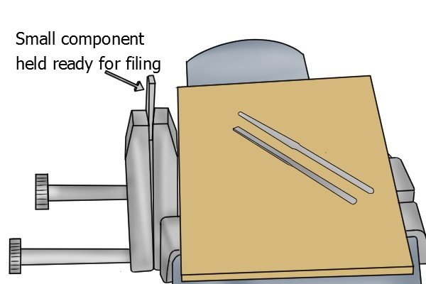A toolmaker's clamp can also be used as a vice to work on very small components. A vice is used for holding or clamping a work piece to allow work to be performed on it with a number of tools. Vices commonly contain a fixed jaw and a jaw parallel to that, which is moved towards or away from the fixed jaw by a screw.