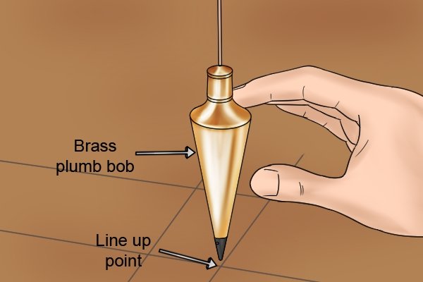 line up the plumb bob mark a point wonkee donkee tools DIY guide how to use a plumb bob