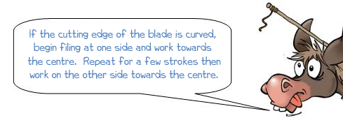 Wonkee Donkee says 'If the cutting edge of the blade is curved, begin filing at one side and work towards the centre.  Repeat for a few strokes then work on the other side towards the centre.  