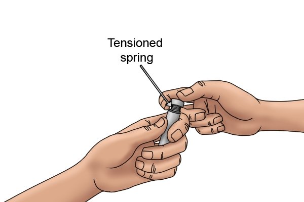 You may need to pull the parts slightly apart to get the oil in between them. If this is the case, make sure you don't distort the spring holding the pieces together as this can permanently damage the tool. 