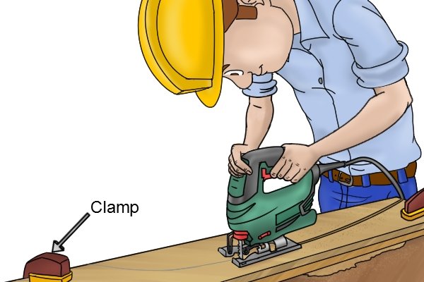 Clamp workpiece when using a jigsaw