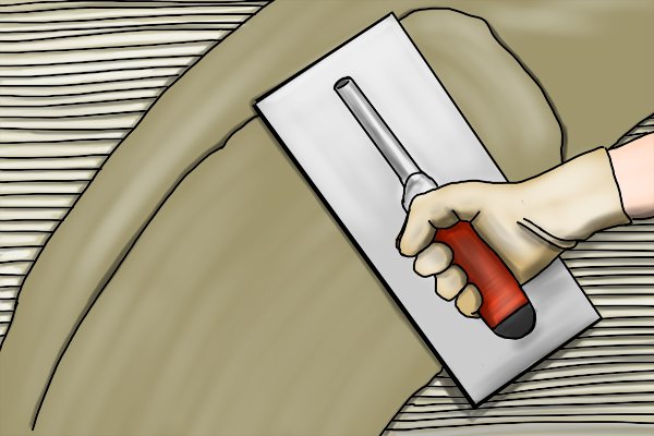 Feather outlet edge trowel