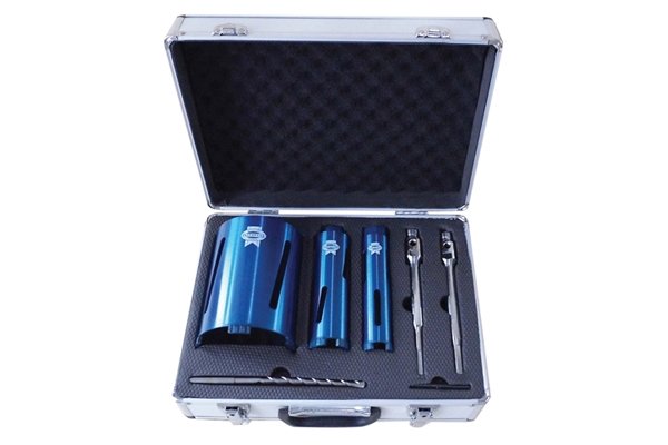 Diamond Core Drill Kit & Case Set of 7 Faithfull 7 Piece Diamond Core Drill Kit for cutting clean holes in brick and concrete blocks. They are ideal for plumbing, electrical, engineering installation and general building tasks. All cores are 1⁄2in. BSP threaded with 8mm turbo segments. Set contains: 3 x Diamond Cores with 8mm Turbo Segments: 38mm, 52mm, and 117mm. 1 x SDS Plus Extension Adaptor 10mm x 200mm. 1 x Hex Extension Adaptor 12mm x 200mm. 1 x A-Taper Pilot Drill 10mm x 200mm. 1 x Extractor Drift Key. 1 x Carry Case. ROTARY USE ONLY – Must not be used on Percussion/Hammer mode. DO NOT USE DIAMOND CORES LARGER THAN 78mm IN DIAMETER WITH SDS PLUS DRILLS AS THIS MAY RESULT IN DAMAGE TO THE POWER TOOL OR SDS ADAPTOR. Diamond Cores give the best results when used with a purpose built core drilling machine.