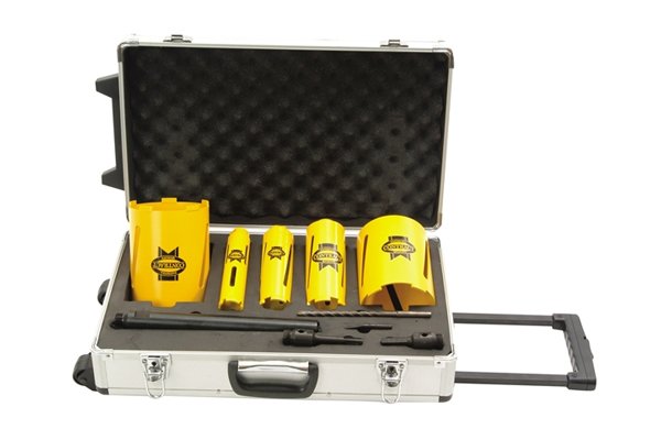 Diamond Core Drill Kits 1/2in BSP Thread Ideal for plumbing, electrical, engineering installation and general building tasks. 5 dry cutting diamond core drills: 38, 52, 65, 117, and 127 mm. 1/2in BSP thread on all cores. Cuts clean holes with no breakout. Suitable for use in brickwork and blockwork. adapters for use in SDS and 13 mm drill chucks. 300 mm extension for cutting through cavities. 38 mm for overflows and feeds. 52 and 65 mm for waste pipes. 117 mm for soil pipes and vents. 127 mm for extractor vents. In a sturdy wheeled aluminium transport case. Also supplied with a drill drift and a pilot drill. NB. HAMMER OR IMPACT DRILLING ACTION MUST NEVER BE USED WITH DIAMOND CORE BITS. 