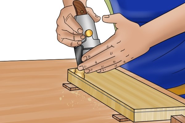 Reducing thickness of wood with a scrub plane