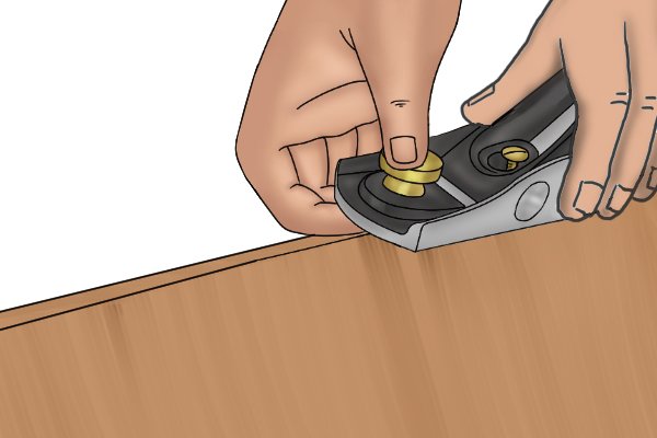 Cutting a chamfer with a block plane