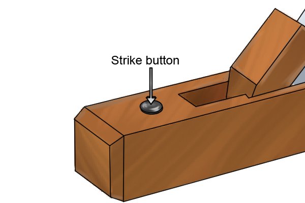 Strike button of a wooden block plane