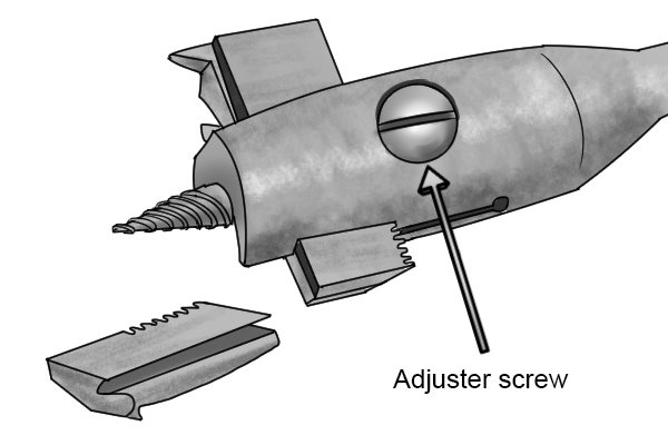 Image showing how the diameter of a wright patent expansive bit is adjusted by rotating the adjuster screw