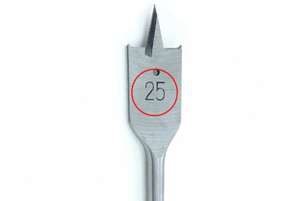 Close up of a size stamp on a spade bit