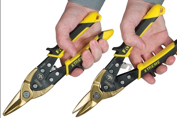 Tin snips are easier to use and cheaper, but aviation shears are more versatile.