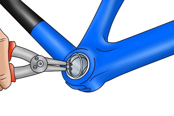 The bearings in the bottom bracket of bicycles are usually held by a retaining ring circlip