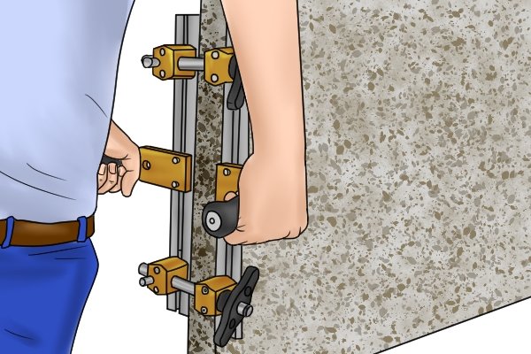 For moving heavyweight slabs, worktops and other sheet materials you can get vice grip carry clamps