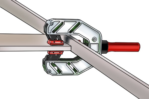 The additional jaw allows the clamp to put pressure wherever is needed