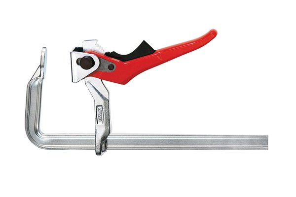 A lever clamp has a lever for adjusting the jaws quickly