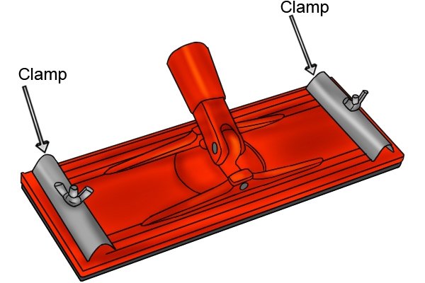 A pole sander has two clamps on either side of its sander head