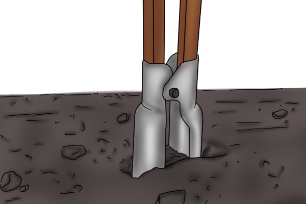 Blades dig into the ground to loosen the soil