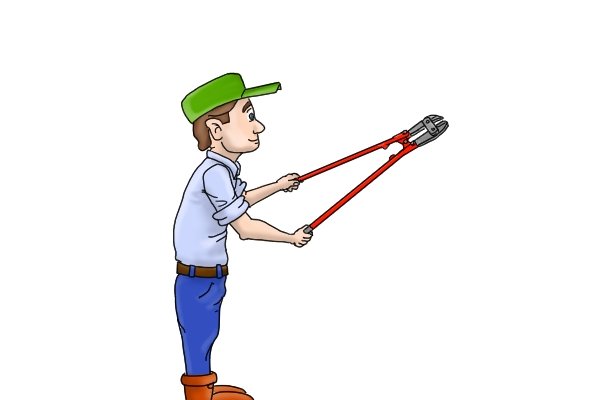 Builder holding red, long-handled bolt cutters