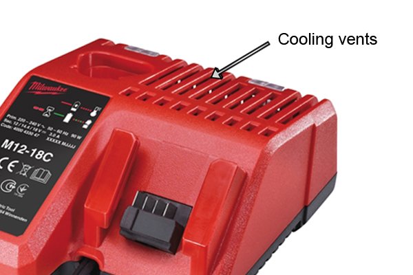 Cooling vents of a charger need to be cleaned to keep them free of dust so the charger can charge the cordless power tool battery properly.