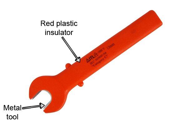Insulated spanner showing the red plastic insulation and the conducting metal body of the tool.