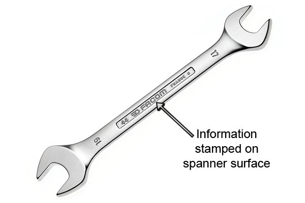 Information (manufacturer, product number, size) stamped on spanner surface with hydraulic press.