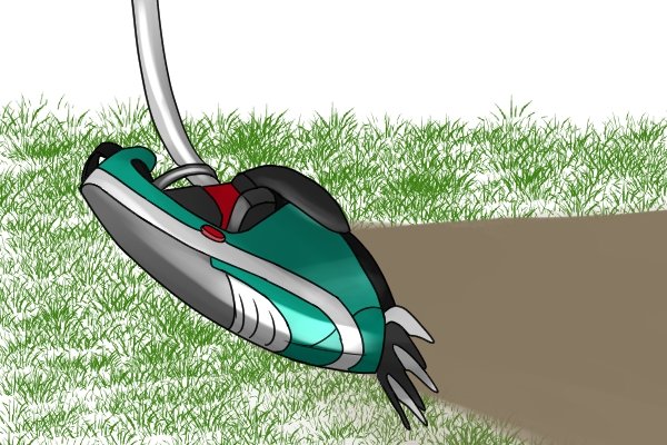 Trimming edge of lawn with battery powered shears