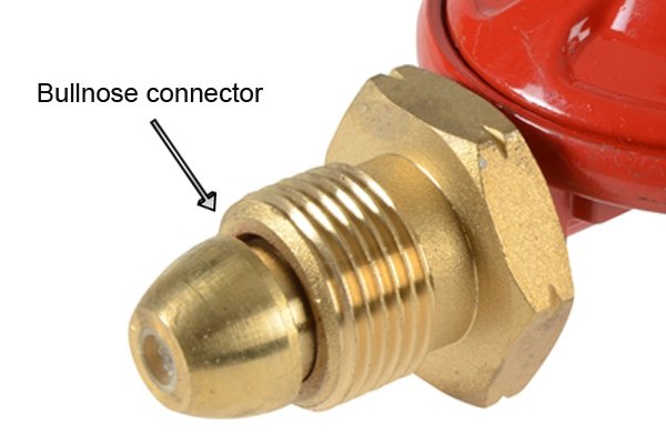 Close-up of gas regulator bullnose connector