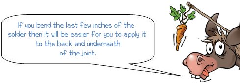 Wonkee Donkee says "If you bend the last few inches of the solder then it will be easier for you to apply it to the back and underneath of the joint"