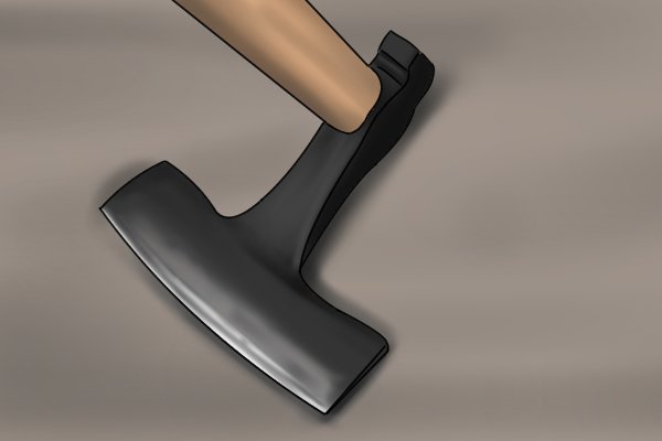 Image of a flared adze blade to illustrate width
