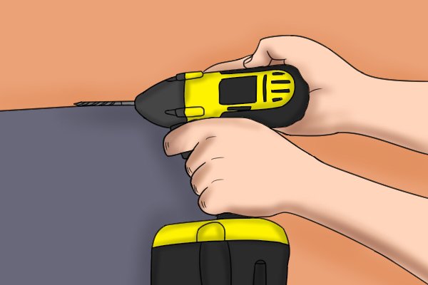 Reaching the controls on a cordless impact driver