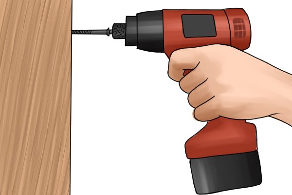 Installing a cabinet with a long screw and a cordless impact driver