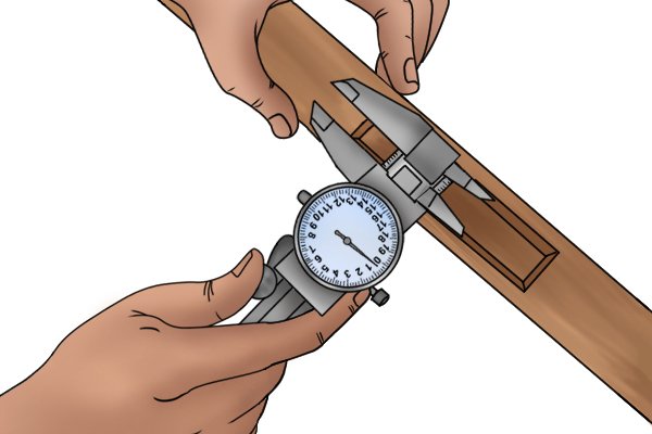 Step 4  Then measure the dimension to be compared (in this example, this is dimension B).     The value shown by the dial indicator will be the difference between A and B.