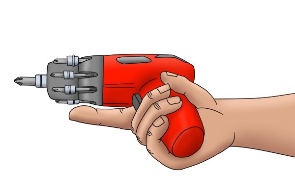 User holding cordless screwdriver with finger releasing trigger