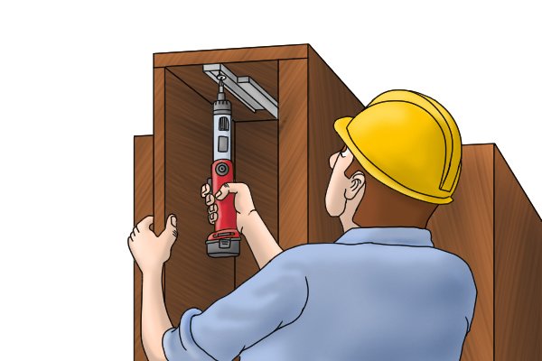 Using a cordless screwdriver upright