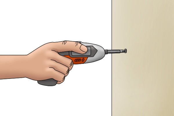 Cordless screwdriver drilling hole