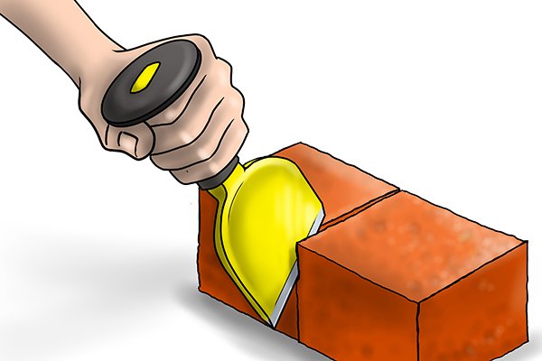 Cutting a brick using a brick bolster