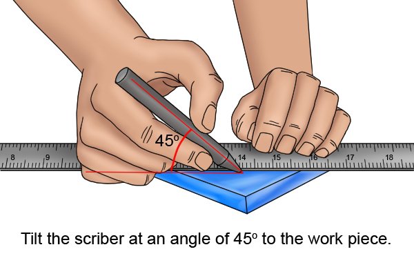 What angle should you hold an engineers scriber?, Tilt the scriber at an angle of 45 degrees to the work piece