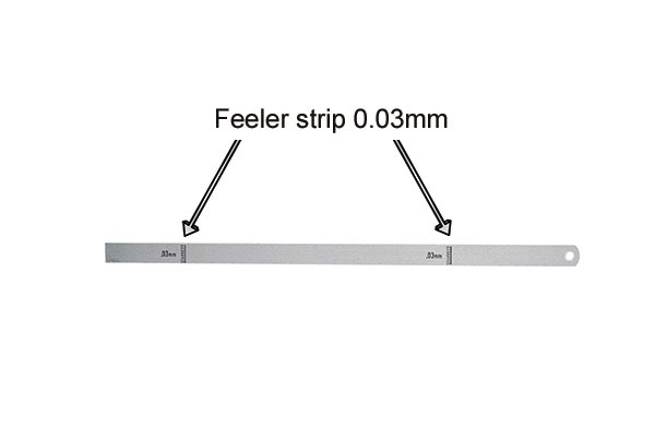 Feeler gauge strip and measurement
