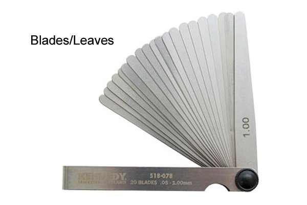 Feeler gauge fanned open to show feeler blades or feeler leaves