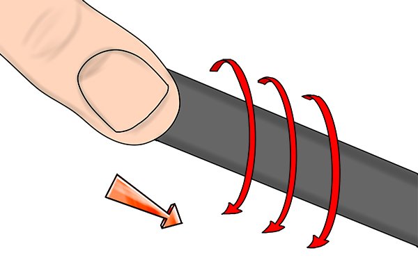Image of a DIYer using a round rasp with a twisting motion to get the best out of the tool