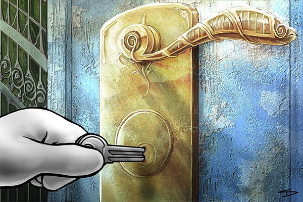 Locksmithing pushing a key blank into a lock
