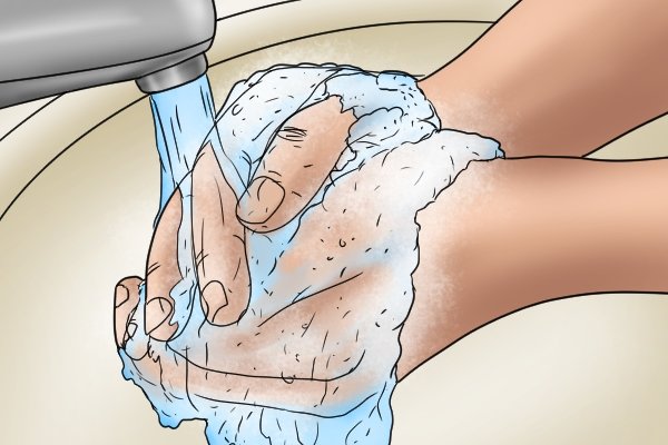 Image showing a DIYer washing their hands in preparation for filing their nails