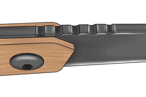 Image of jimping on a knife blade that has been created through the use of a chequering file