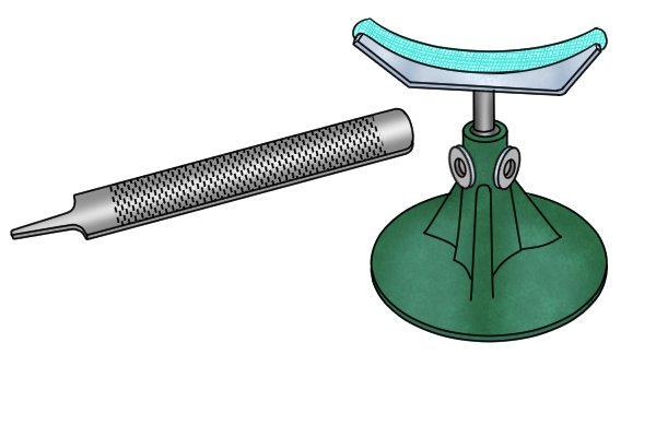 Image showing a horse rasp and a hoof jack, the essential tools for grooming a horse's hooves